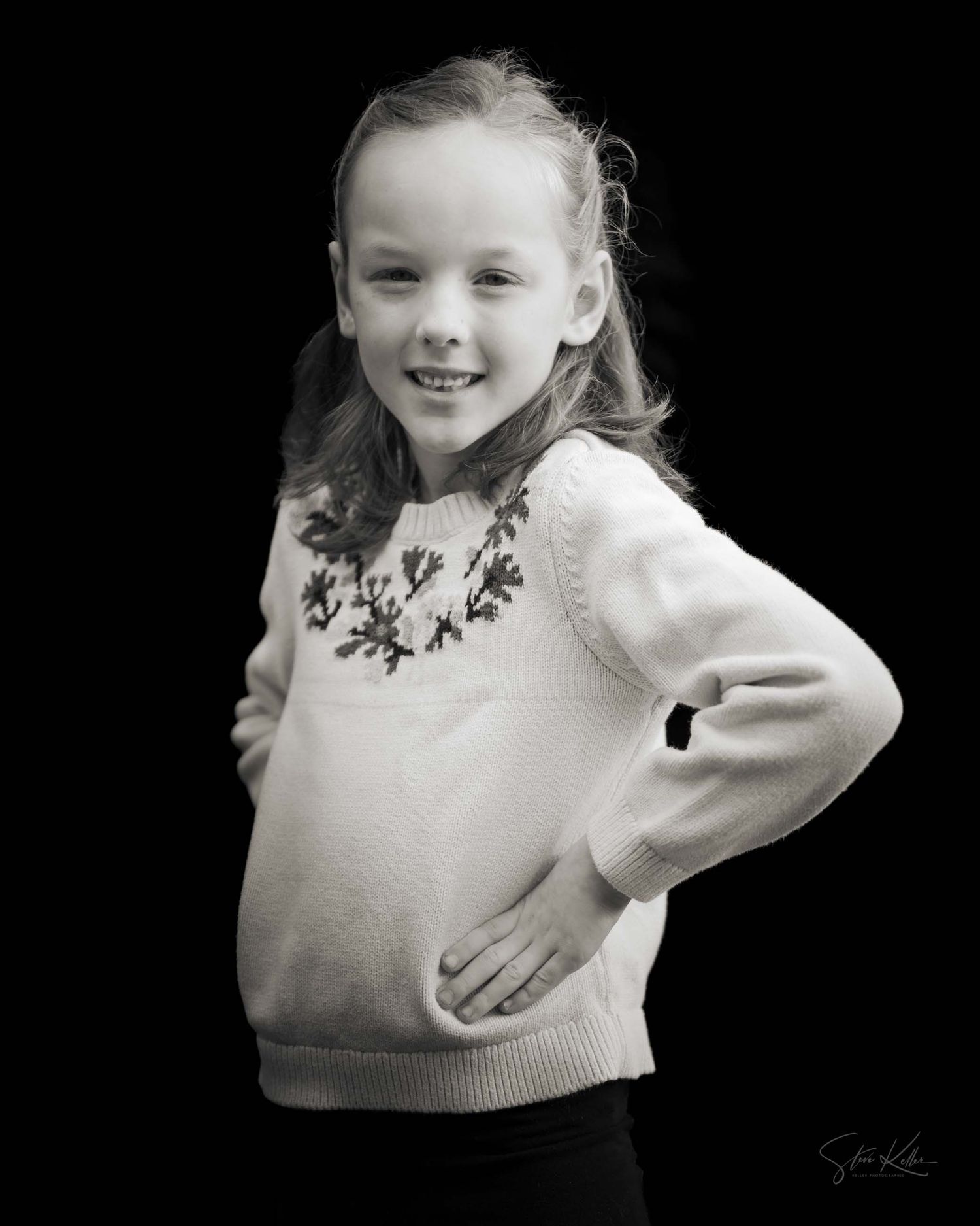 Black and white artistic portrait series showing joyful expressions and movement against dark background.