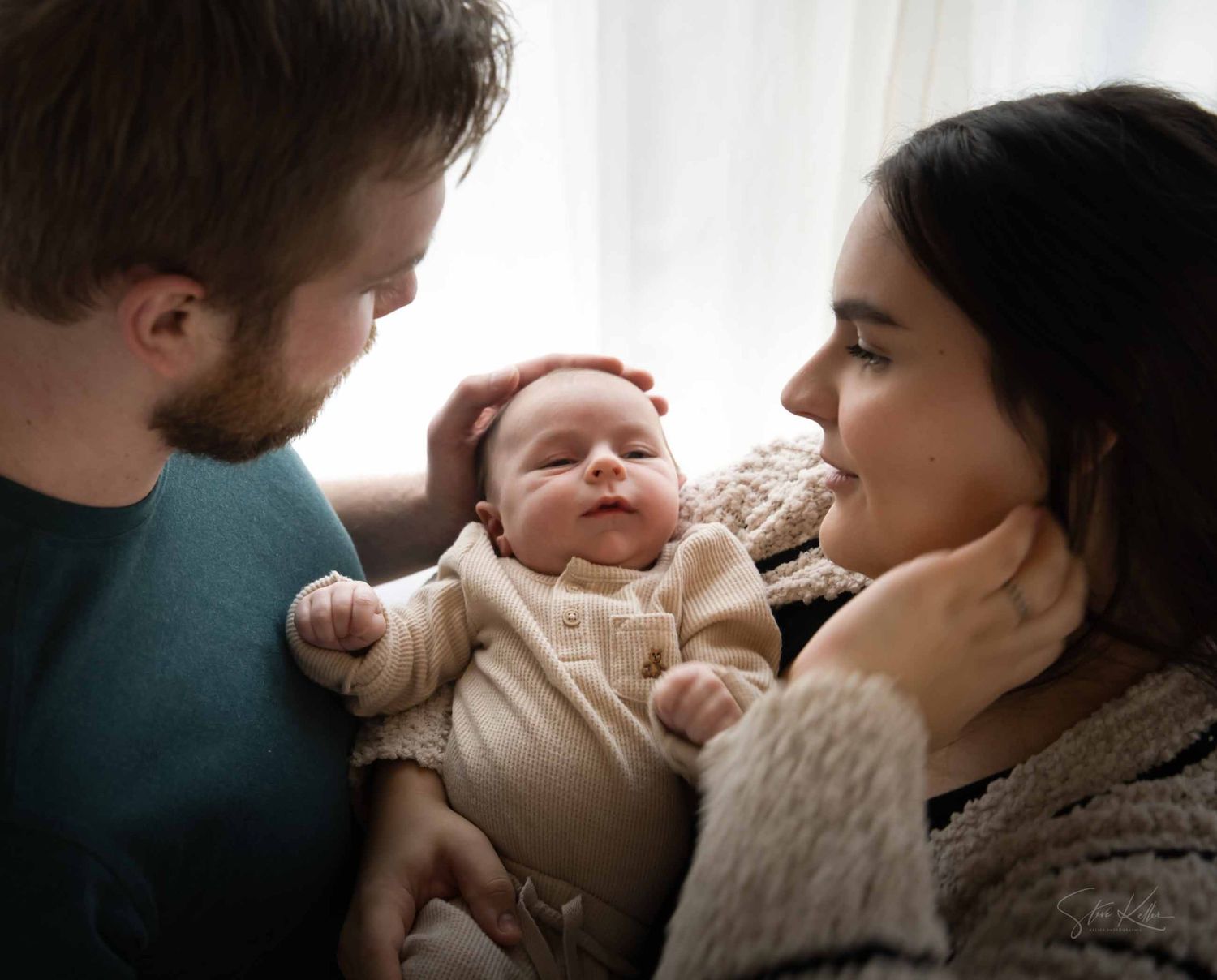 A tender series of intimate family moments showing a parent and baby in soft, natural lighting.