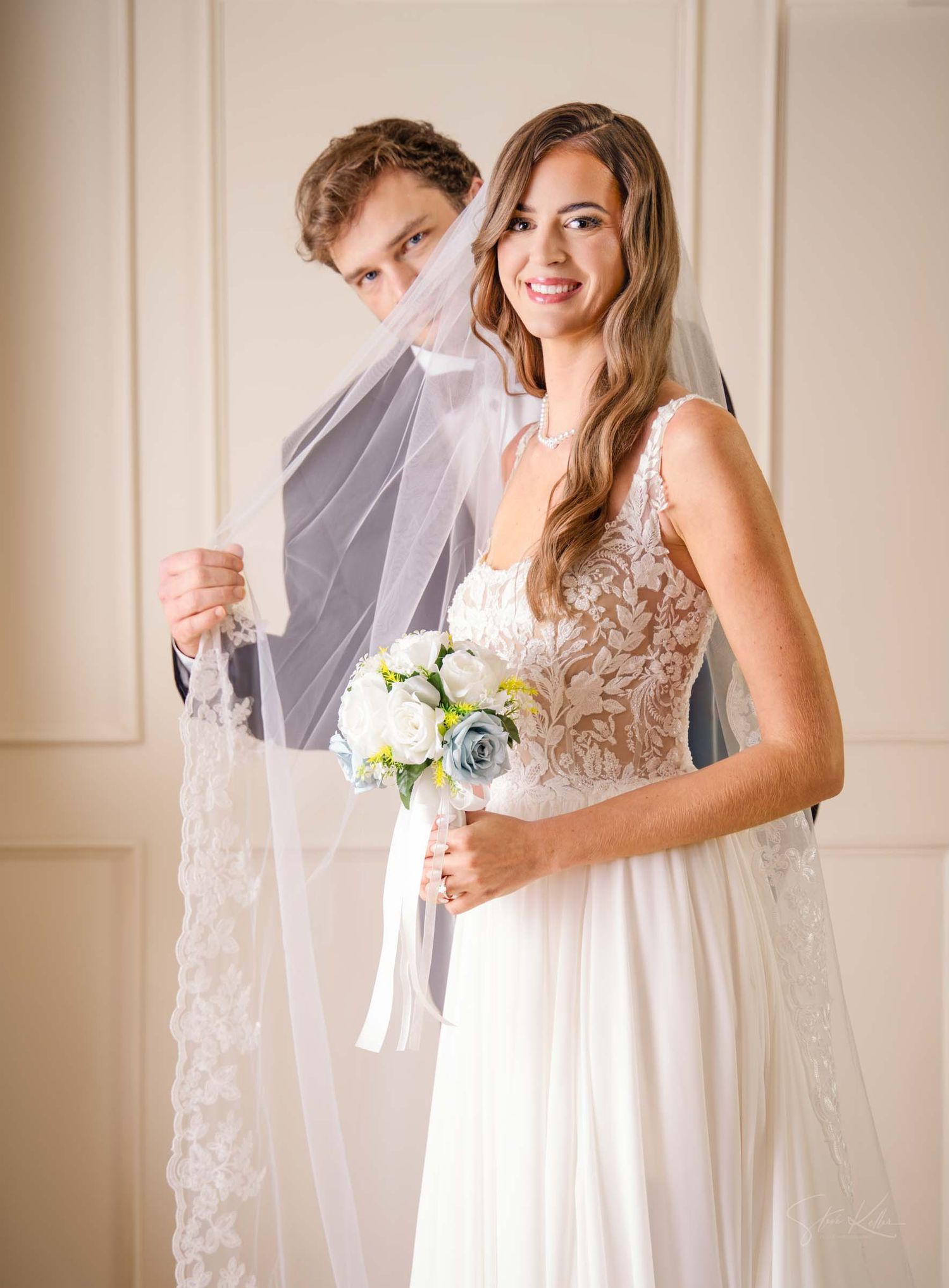 A series of wedding photos showing a bride in a white dress with a blue and white floral bouquet against a beige wall.