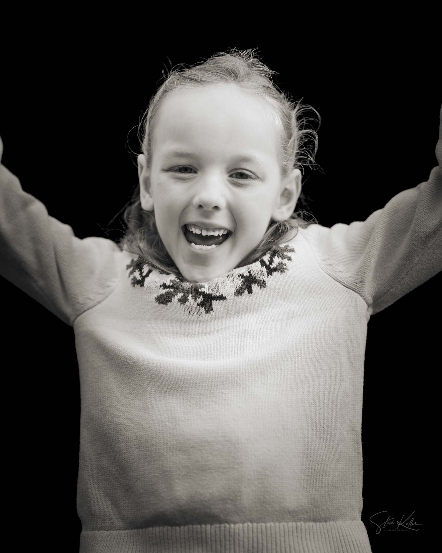 A series of black and white photos showing joyful expressions and a white sweater against a dark background.