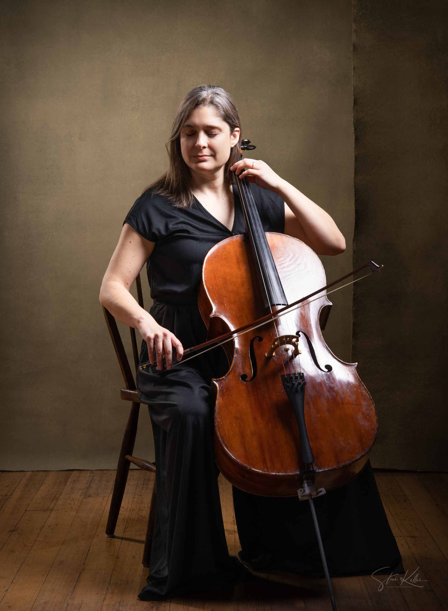 A cellist in a black dress performs with their instrument against a dark brown backdrop in a series of poses.