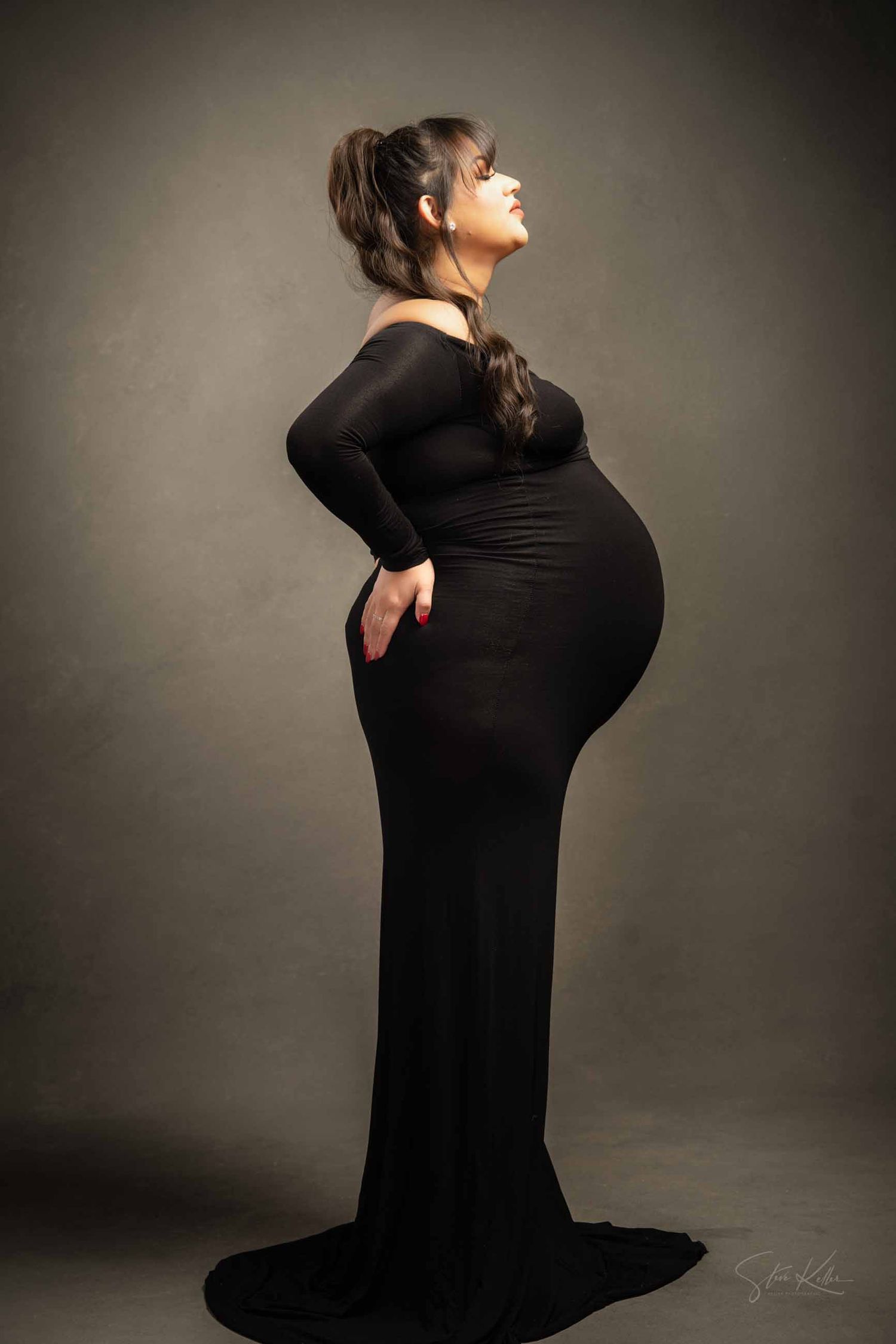 A dramatic black and white photo series showing a figure in black clothing posed against a dark background.
