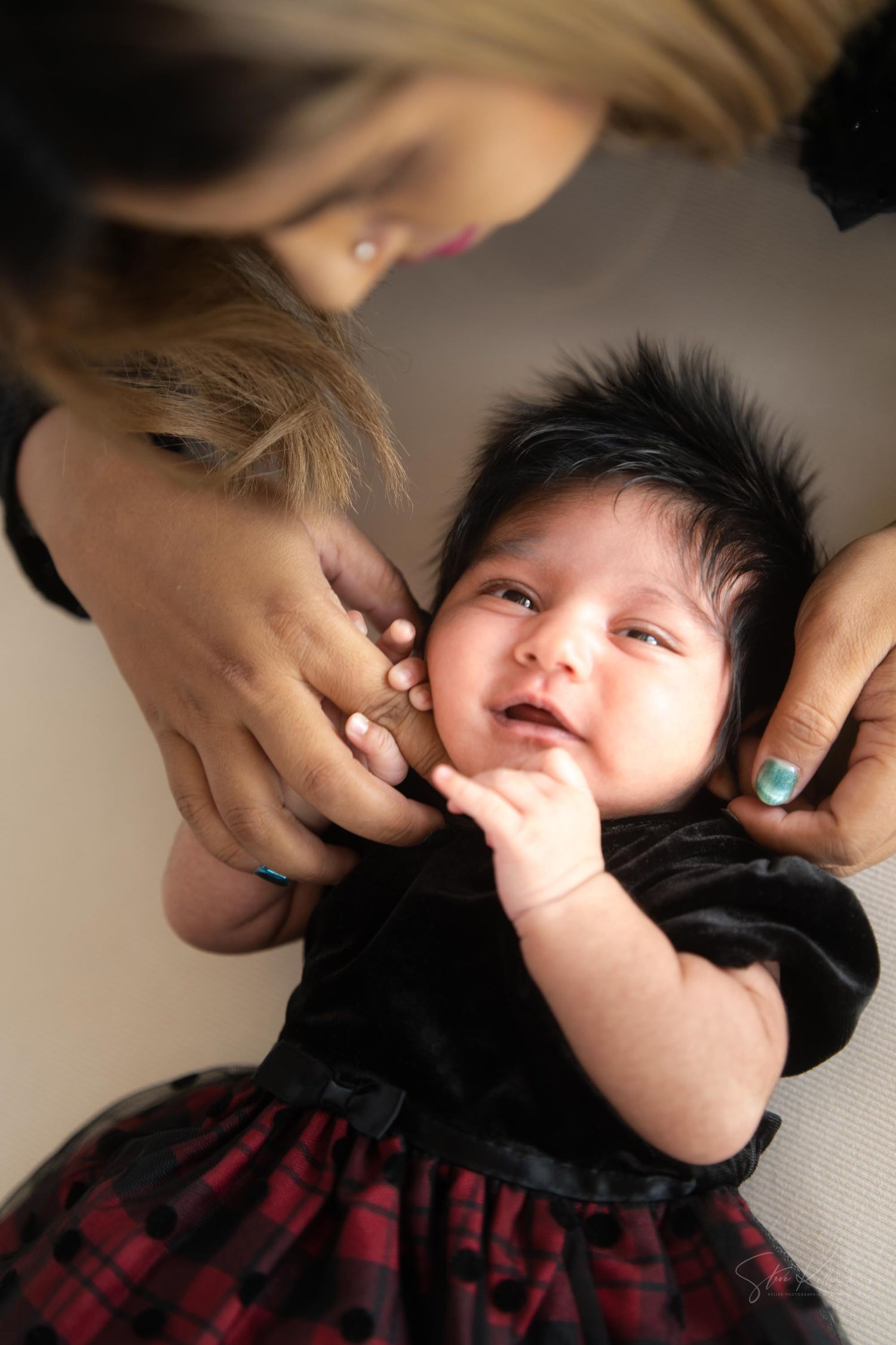 Candid sequence of moments between a parent and baby showing affection and playfulness.