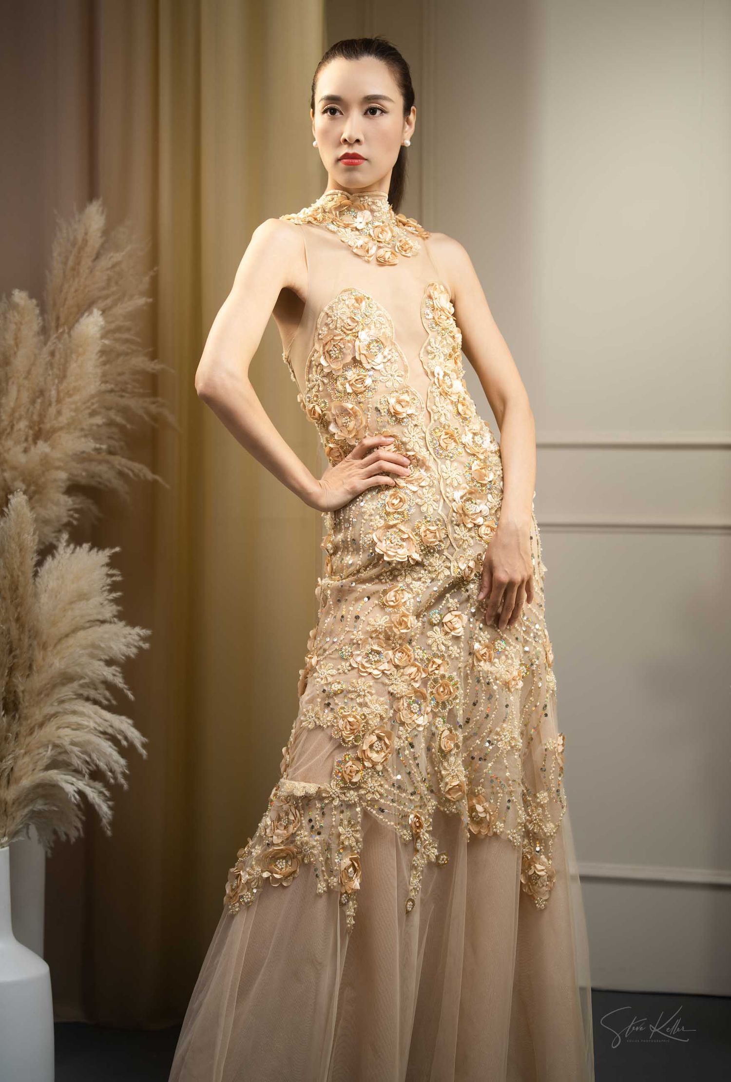 Elegant evening gown in champagne with delicate floral appliques and tulle skirt showcased in multiple angles.