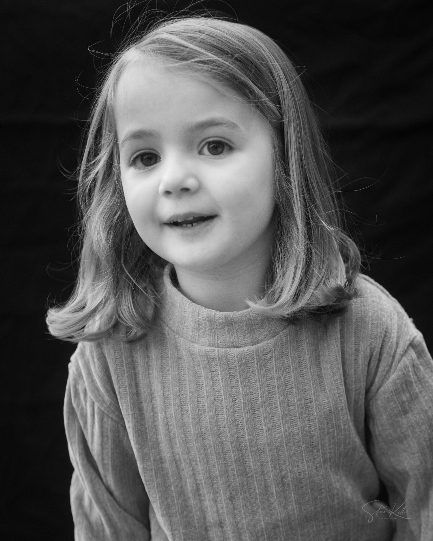 A black and white photo sequence showing a child in a sweater making playful expressions.