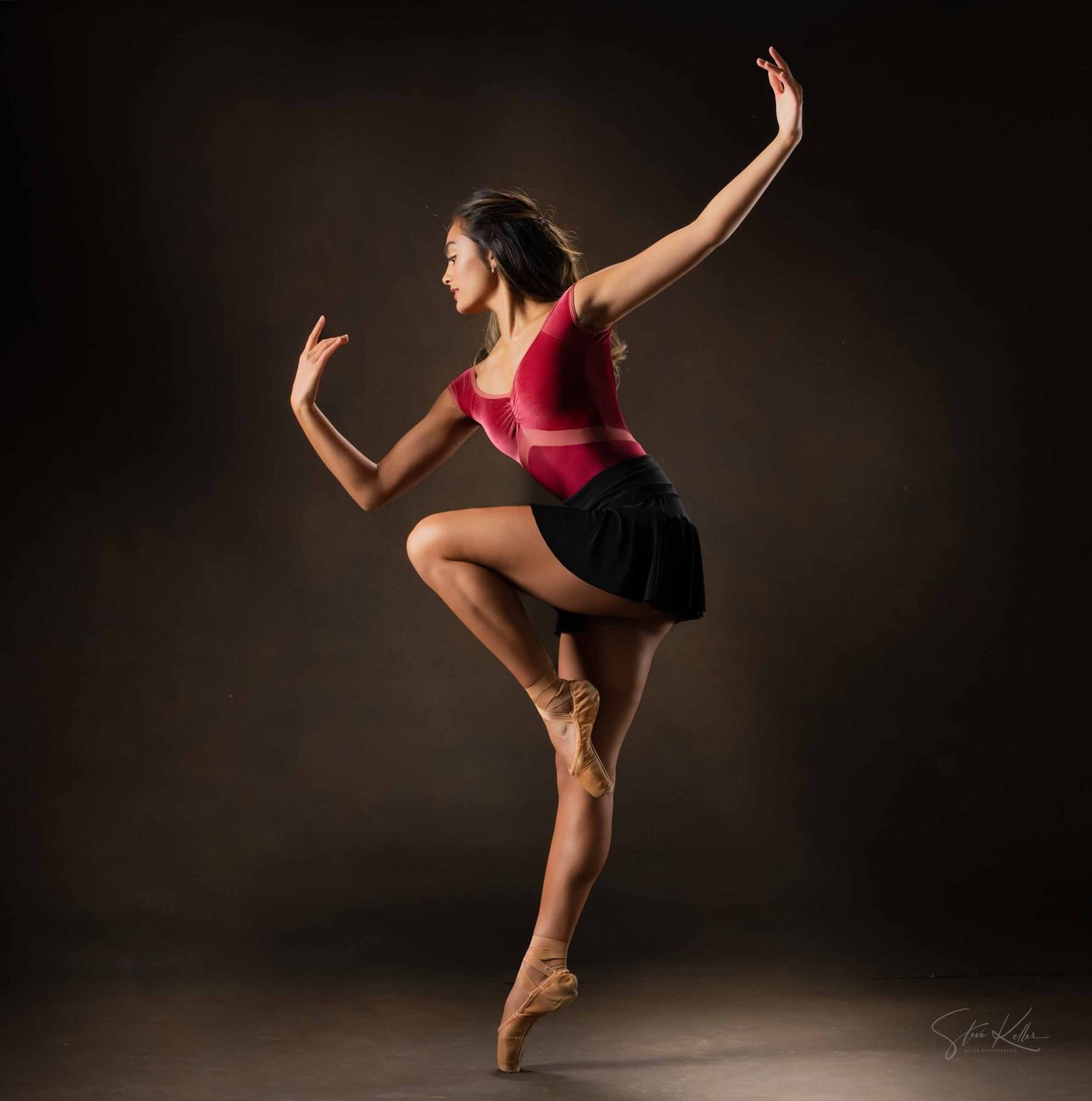 Graceful ballet dancer in black and red performs dynamic poses in a series of artistic studio photographs.