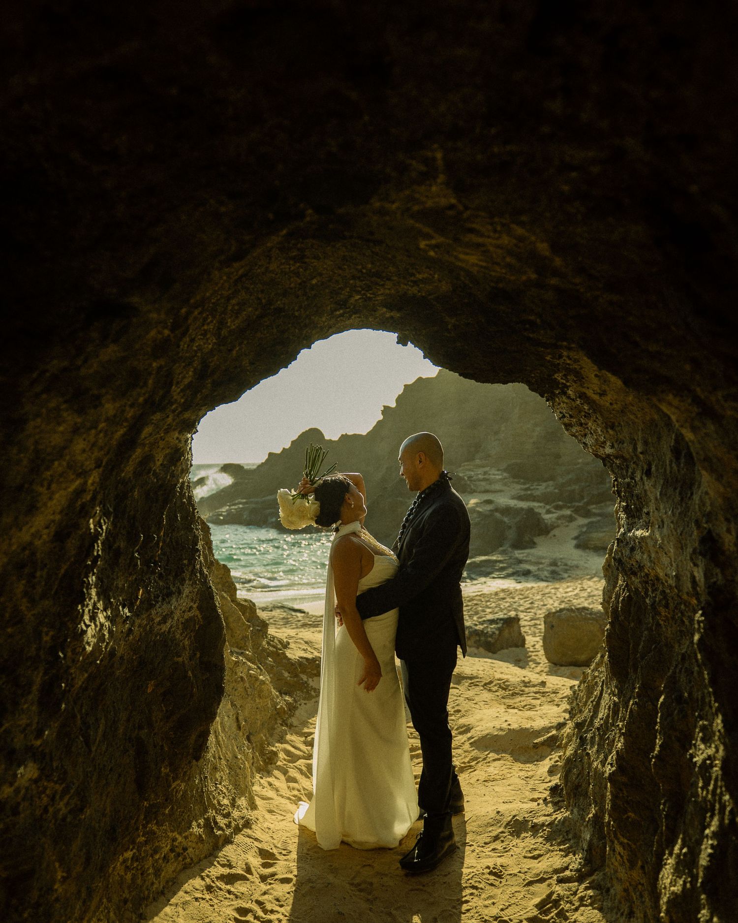 O'ahu beach cave elopement , Hawaii beach cave wedding photos, hawaii elopement on beach, hawaii wedding on beach, romantic photos Hawaii,