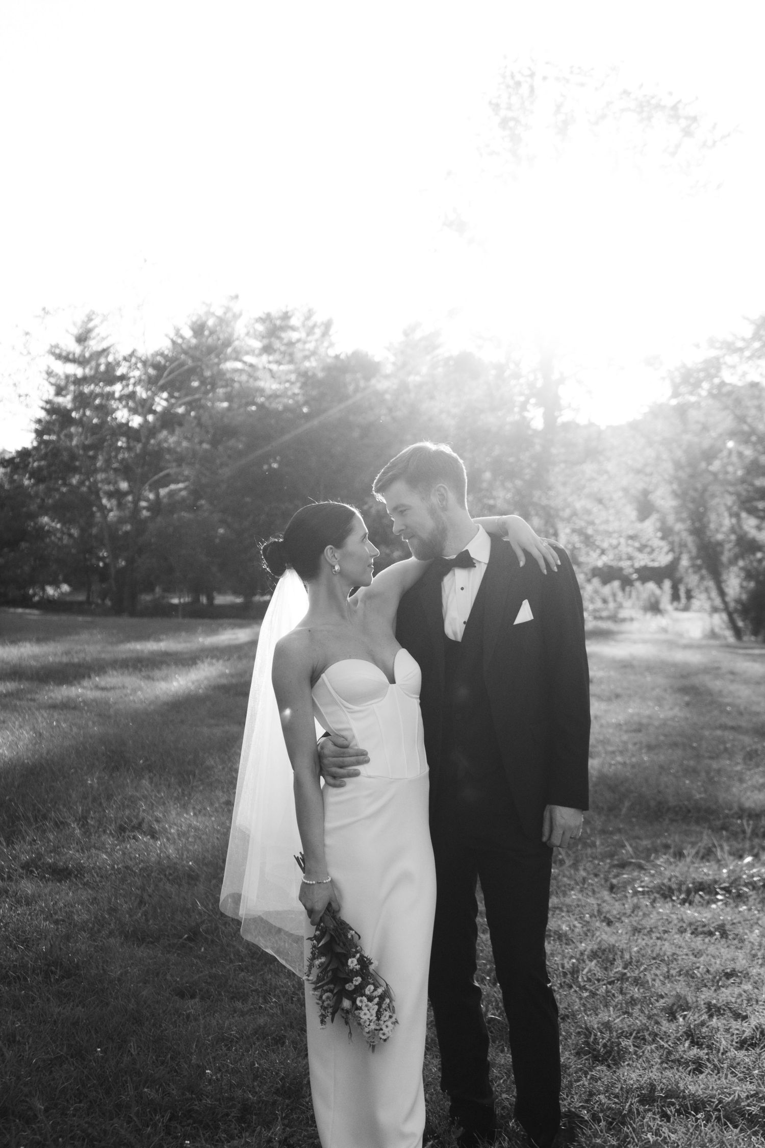 bride and groom during sunset