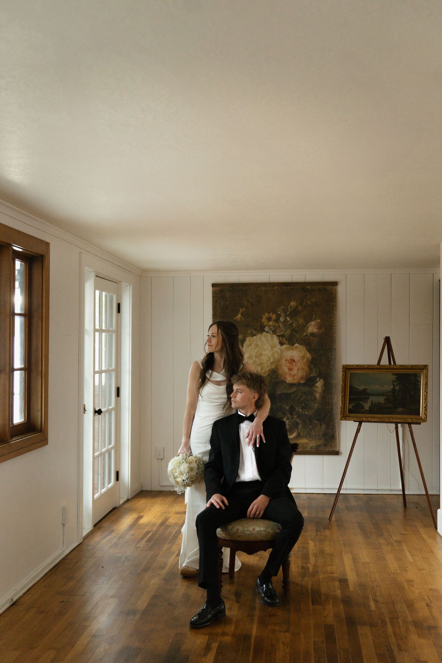 bride and groom in sunroom