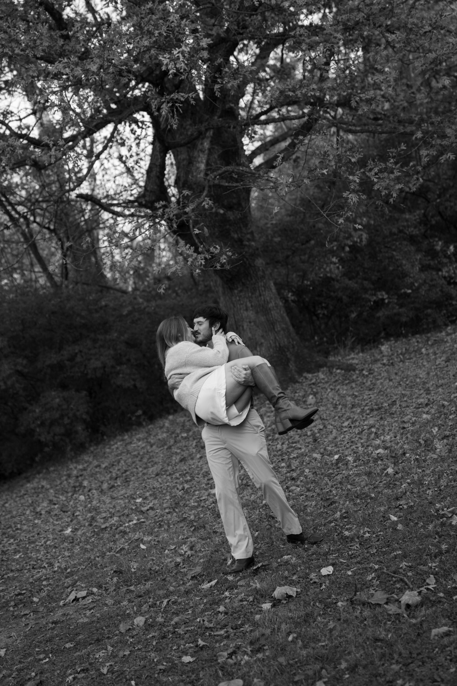 scooping her up off her feet