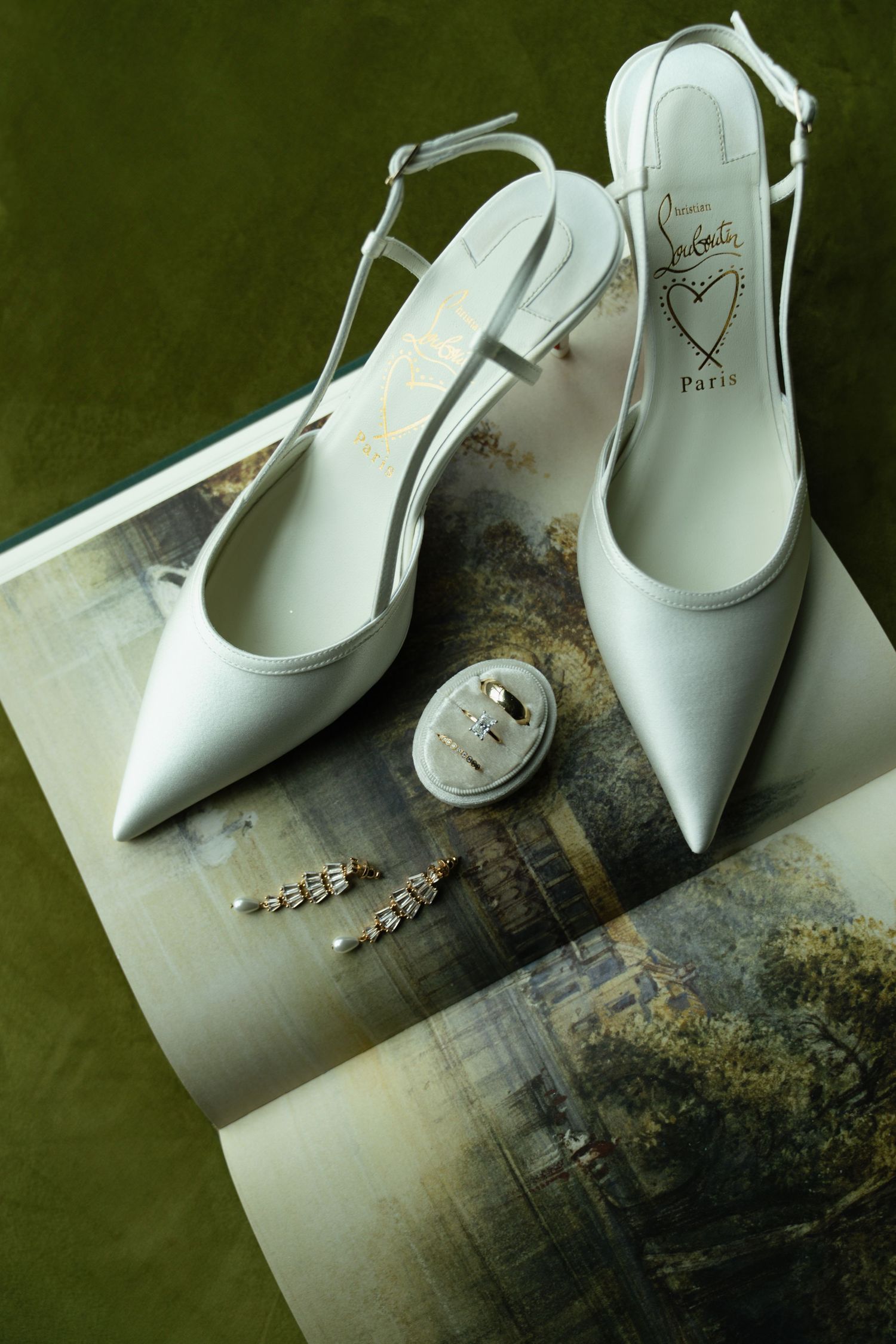 artful flat lay of bride's shoes