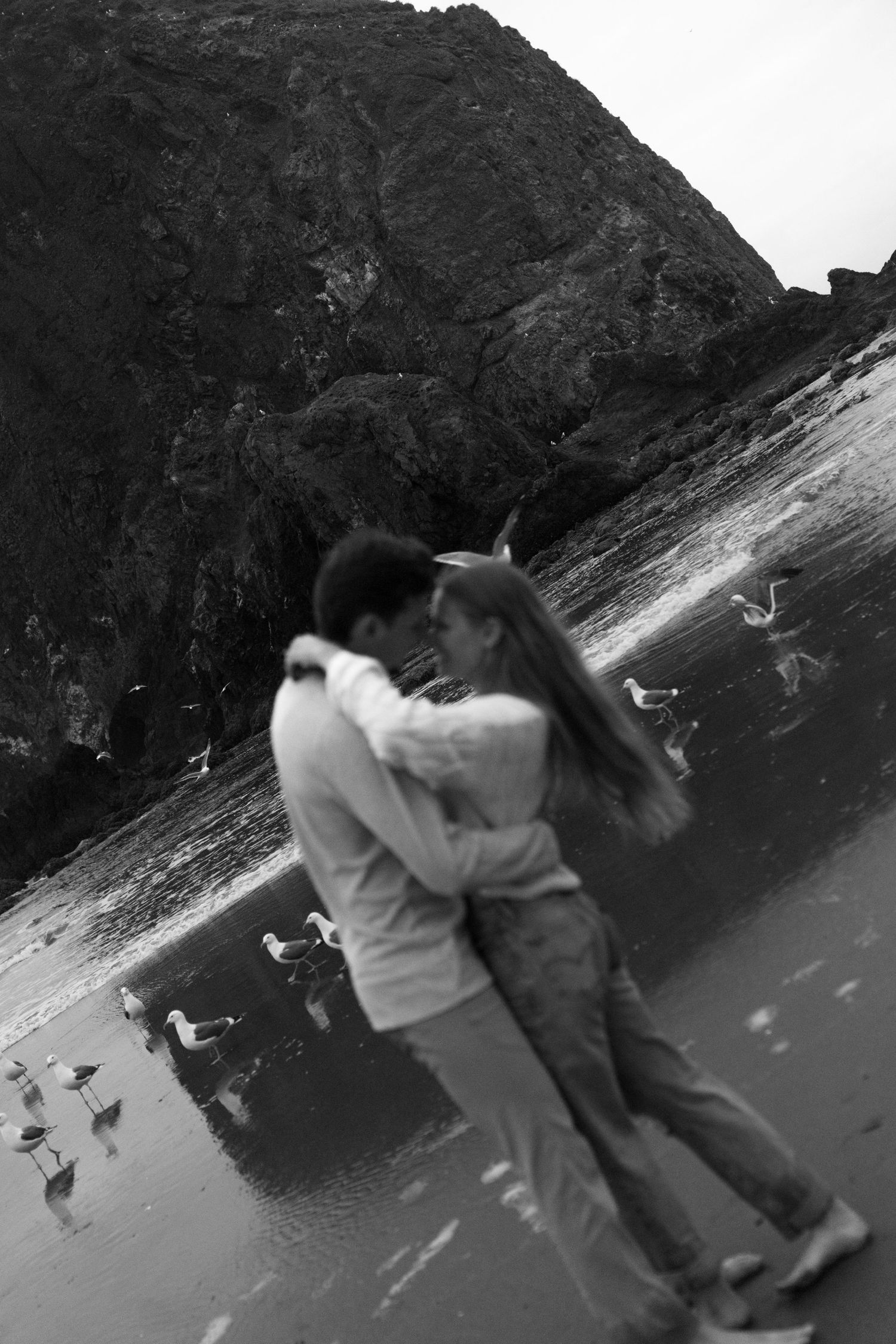 running around cannon beach in Oregon