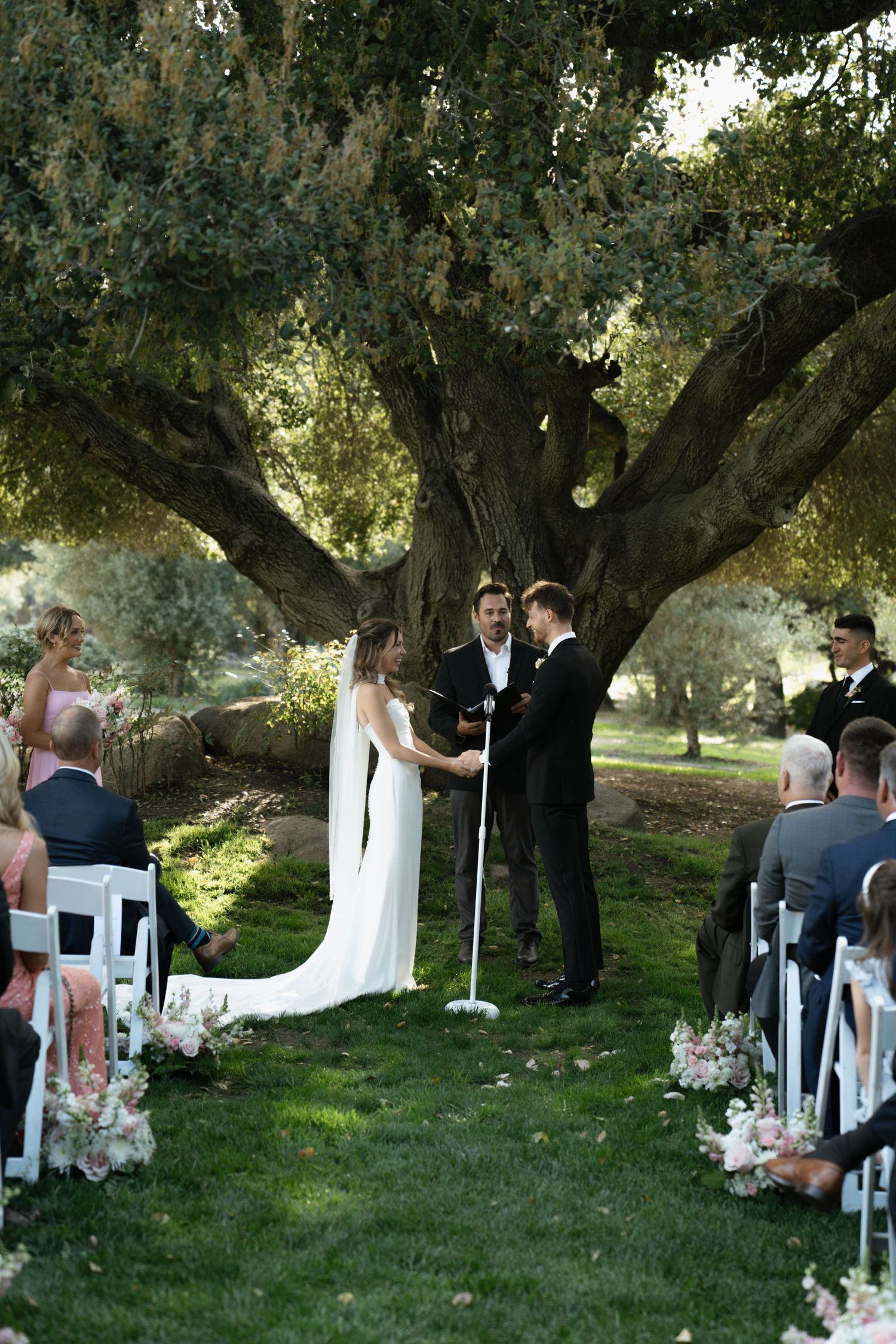 ceremony with lush greens in california