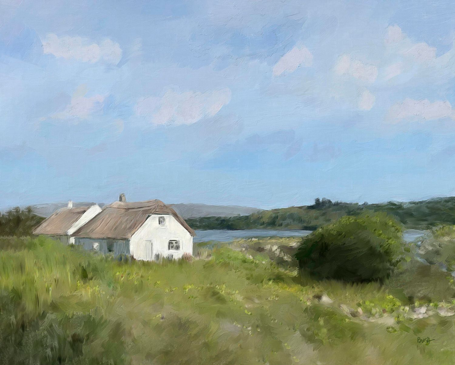 Rustic white cottage in County Galway Ireland nestled on a grassy coastal hillside with water views and blue sky by Bobbie Bush.