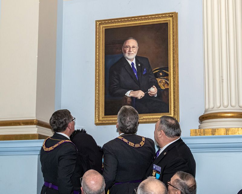 Official unveiling of Grand Master Maggio's formal portrait painting by Bobbie Bush. In the Ionic Hall of the Grand Lodge in Boston.