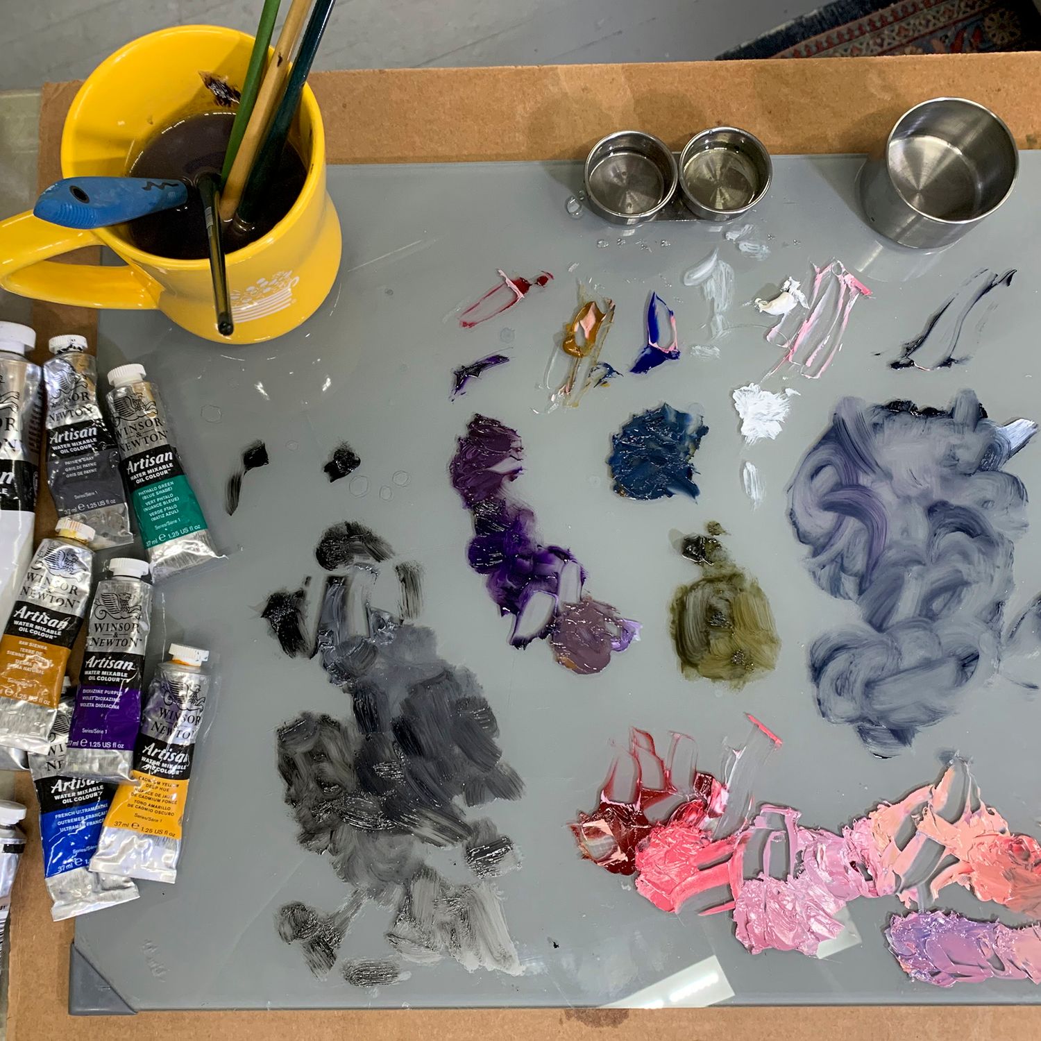 Painters palette during a work in progress.
