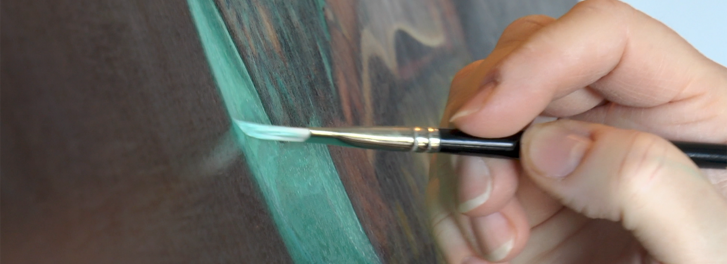 Close-up detail of a painting in progress, with a paintbrush applying turquoise paint onto the canvas.