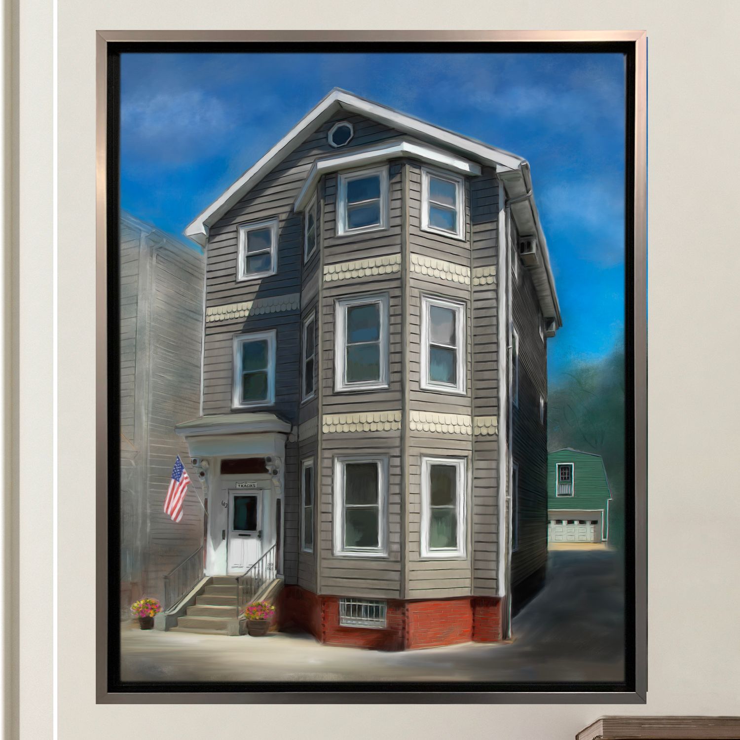 Finished framed and painted rendering of a beloved three-story house with an American flag displayed on the facade.