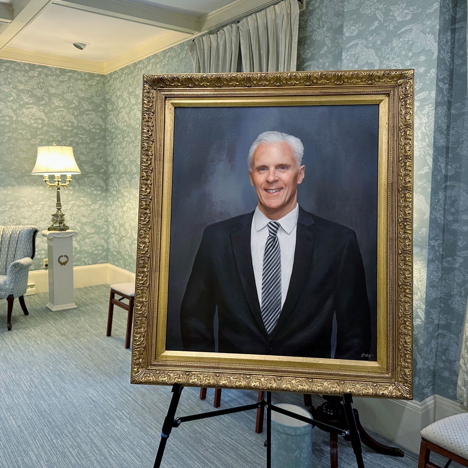 The framed memorial portrait of Frank Murphy at Murphy Funeral home at the unveiling.