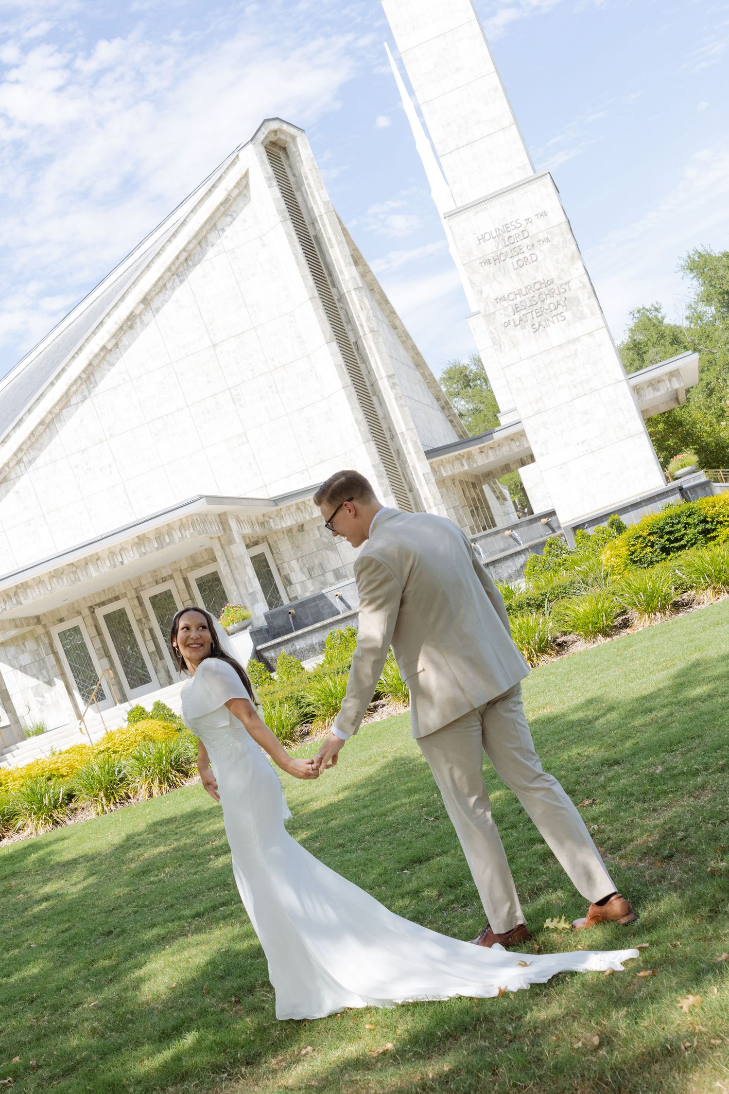 A bride leads a groom to the church temple in Texas on their wedding day.