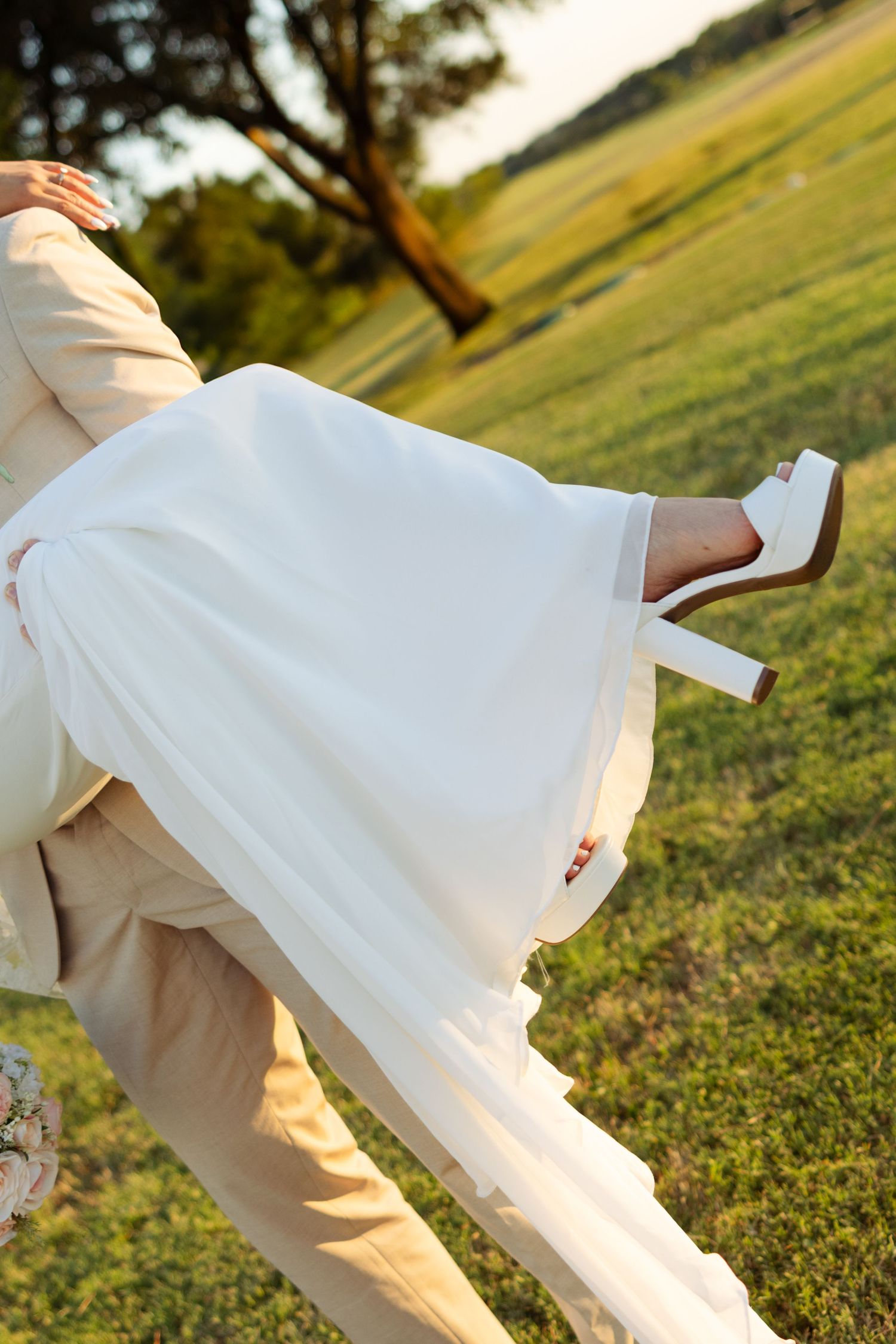 A bride and groom hold each other in Texas on their wedding day.