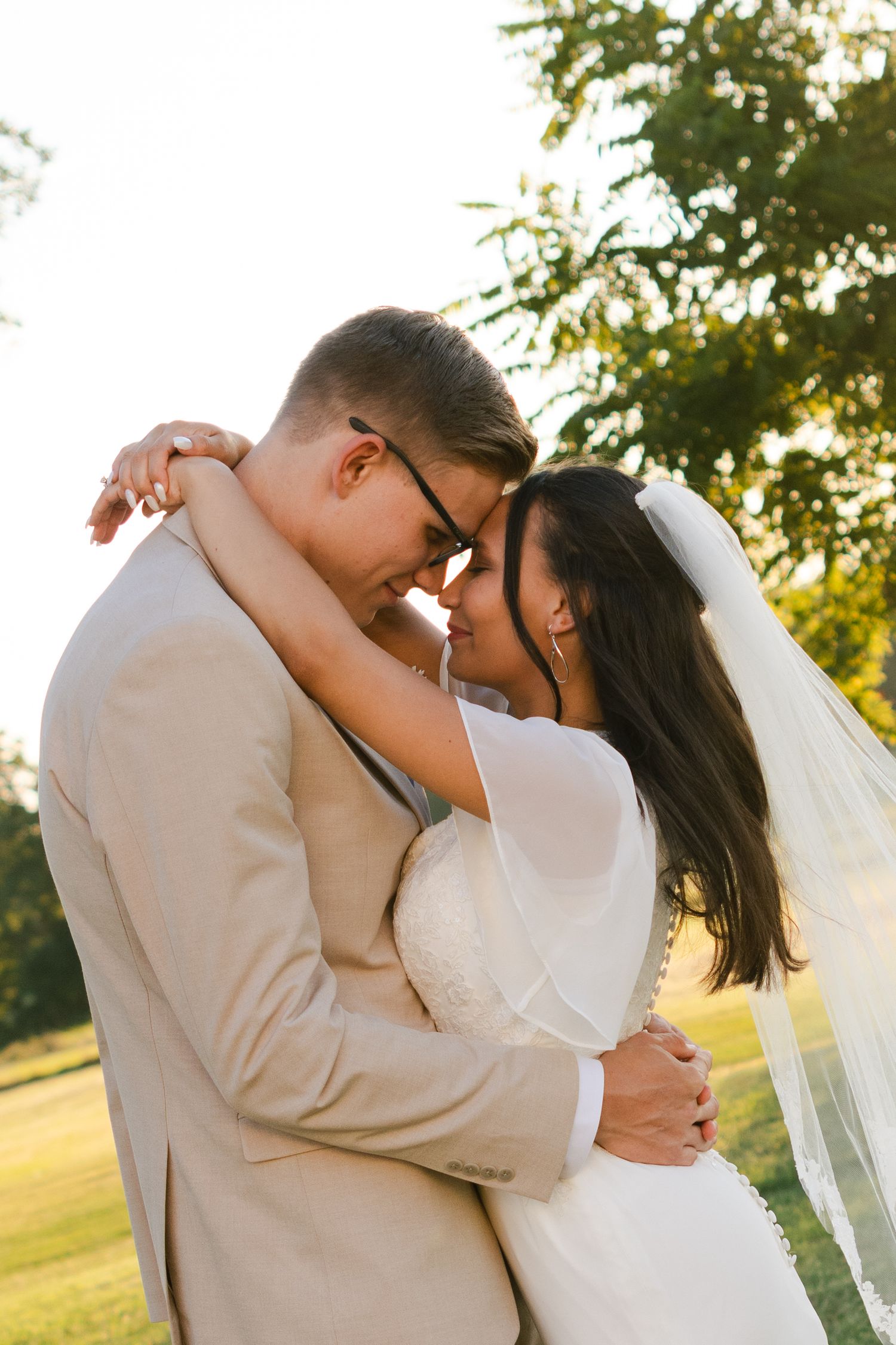 A bride and groom hold each other in Texas on their wedding day.