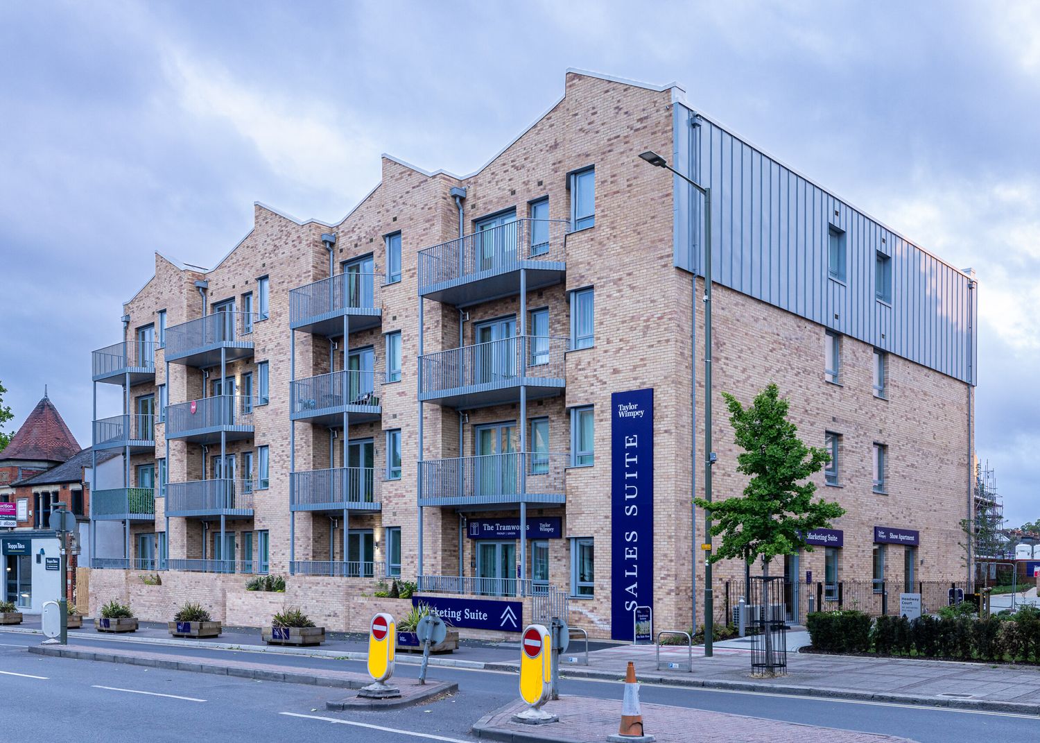 Modern brick apartment building with balconies in North Finchley, London