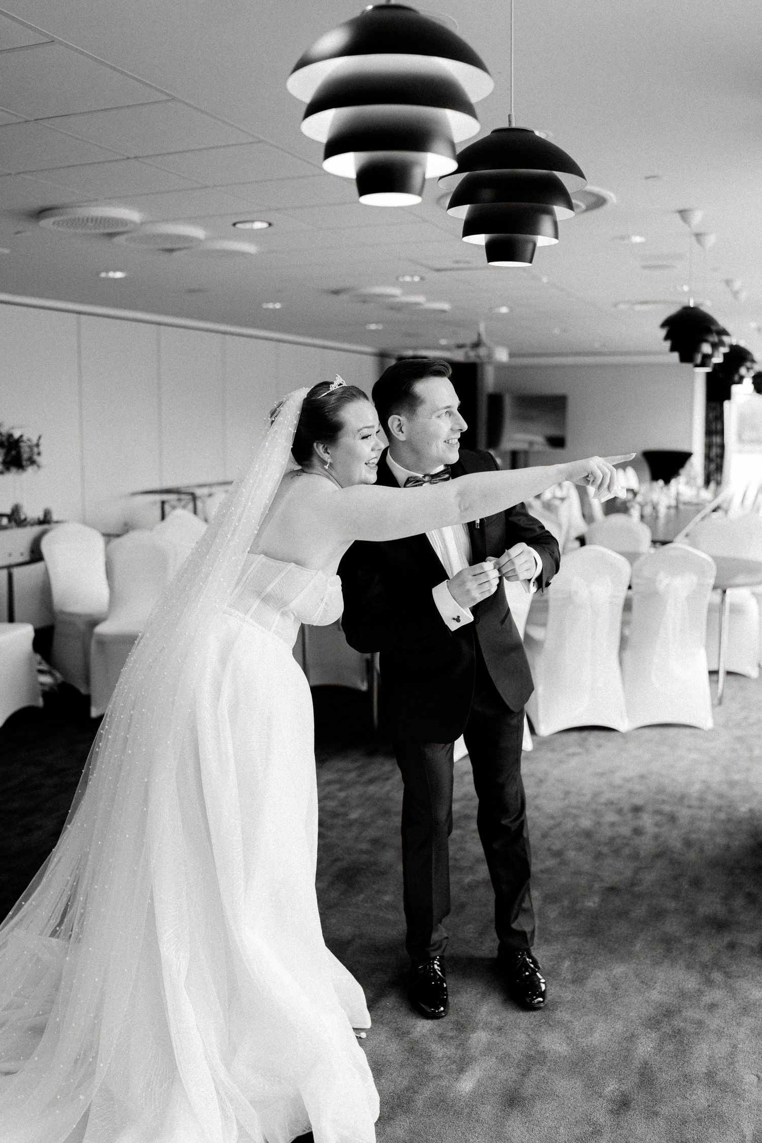 Series of black and white photos showing couple's joyful first look reaction.