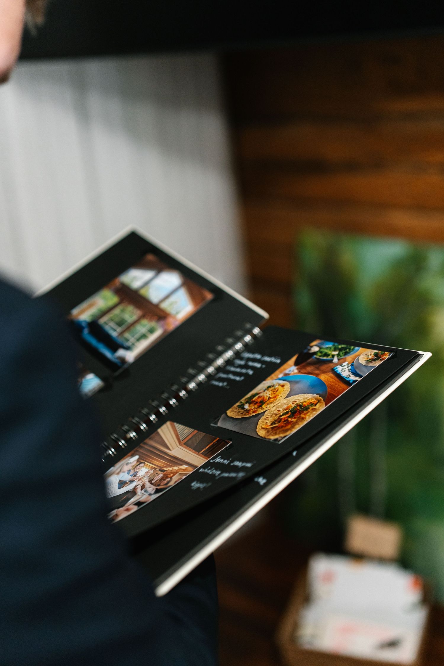 Close-up of photo albums or books displayed in an artistic arrangement.