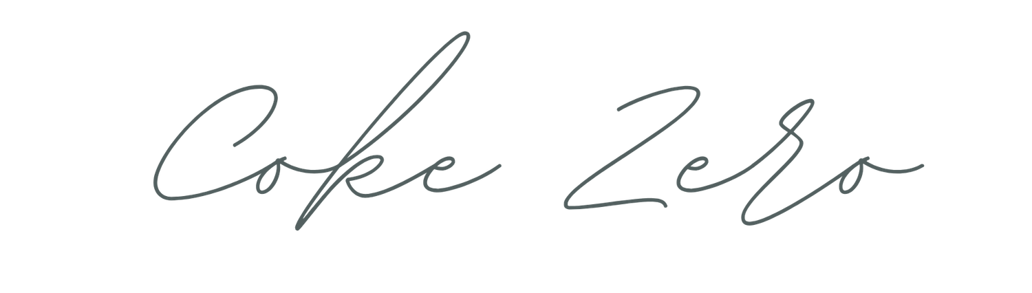 A handwritten signature in black ink on white paper with elegant cursive strokes.