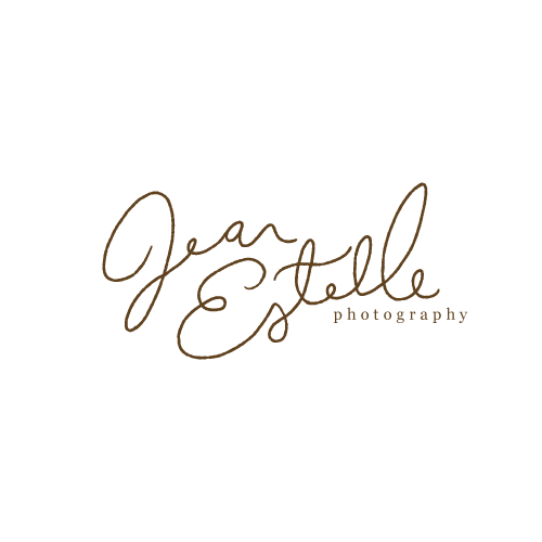 Jean Estelle Photography logo featuring elegant cursive script in warm brown tones on white background.