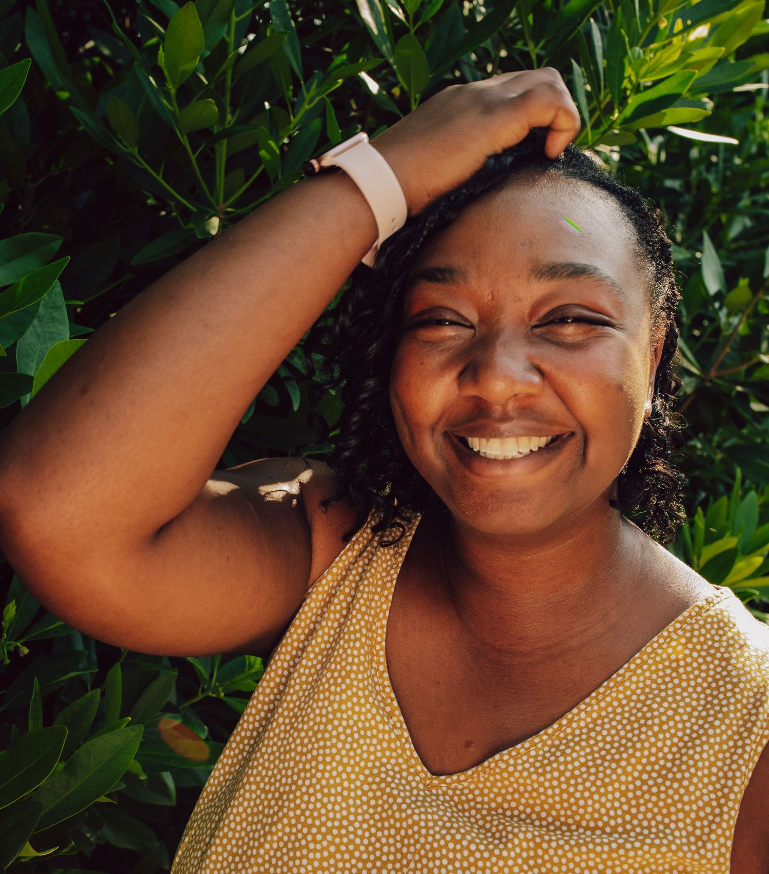 Candid photos in sequence show joyful expressions against a green leafy backdrop outdoors.