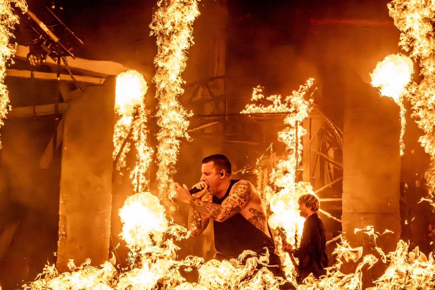 Winston McCall of Parkway Drive performing live surrounded  massive fire and pyrotechnics at Germania Insurance Amphitheater Austin, Texas