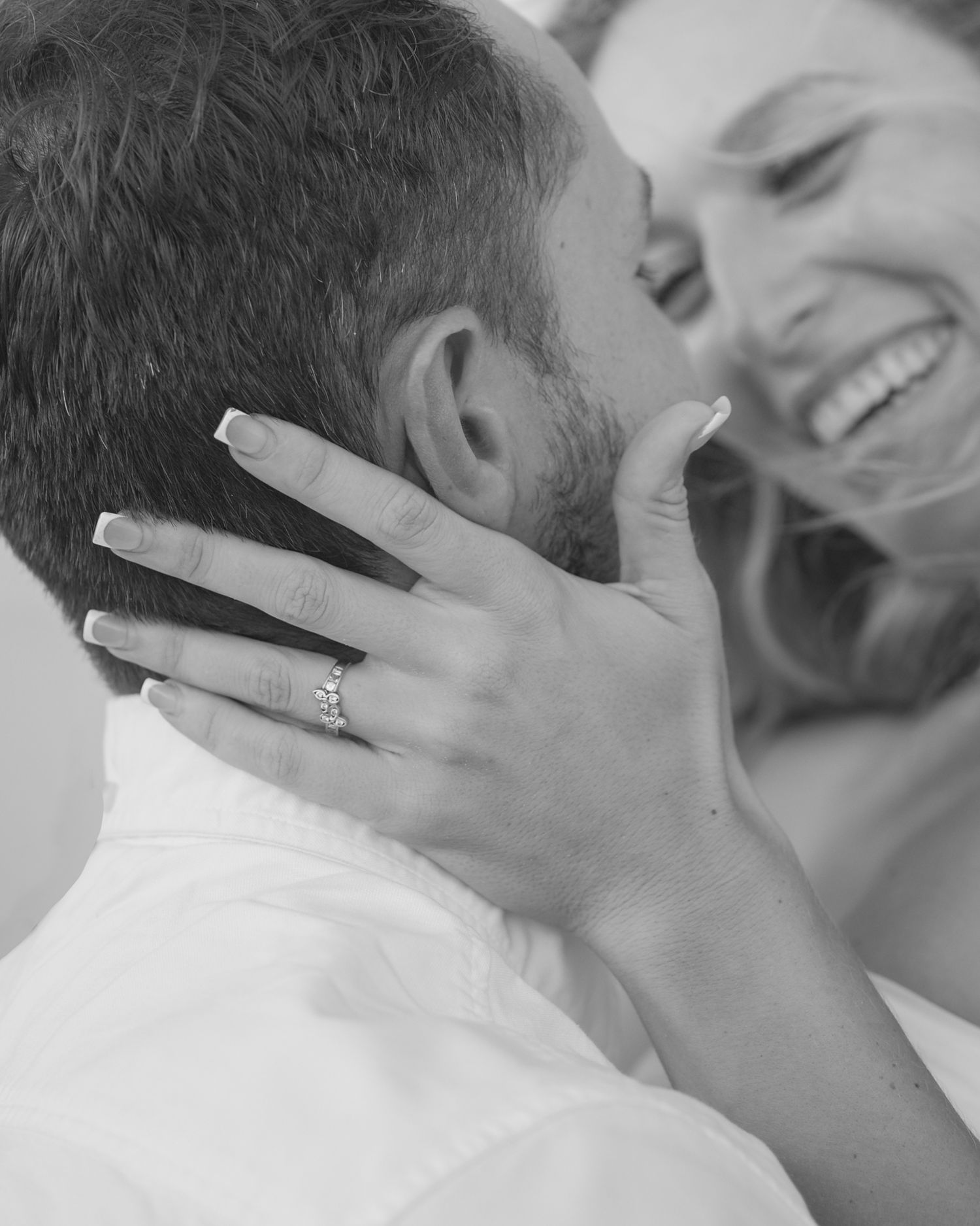 Happy couple celebrating their love during a beach photoshoot in Florida