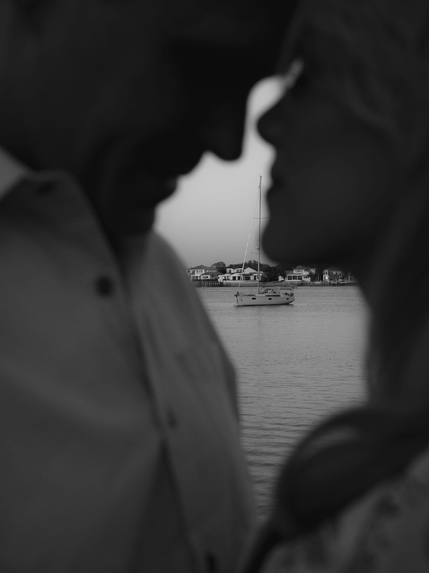 Couple sharing an intimate moment during an engagement session in St. Augustine beach