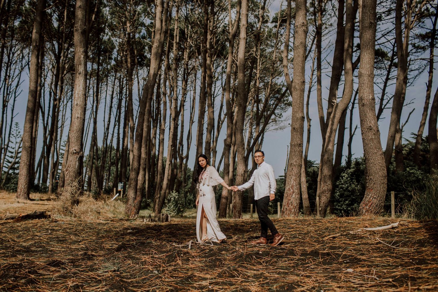 Couple leaning in for a kiss during engagement session