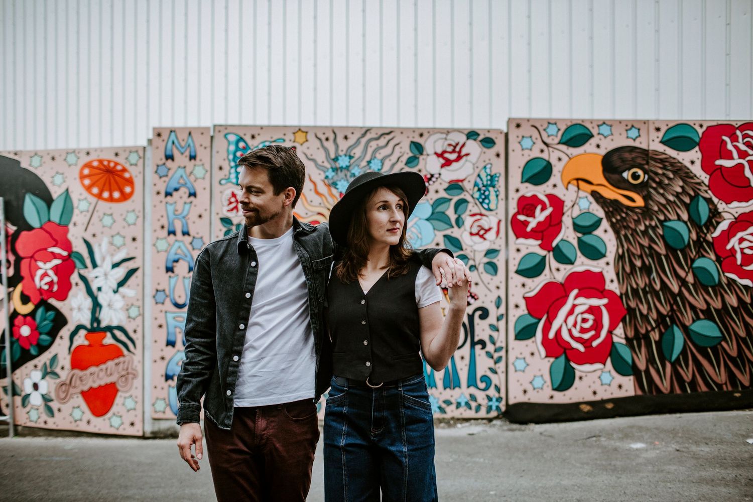 Couple recreating an old photo during anniversary shoot