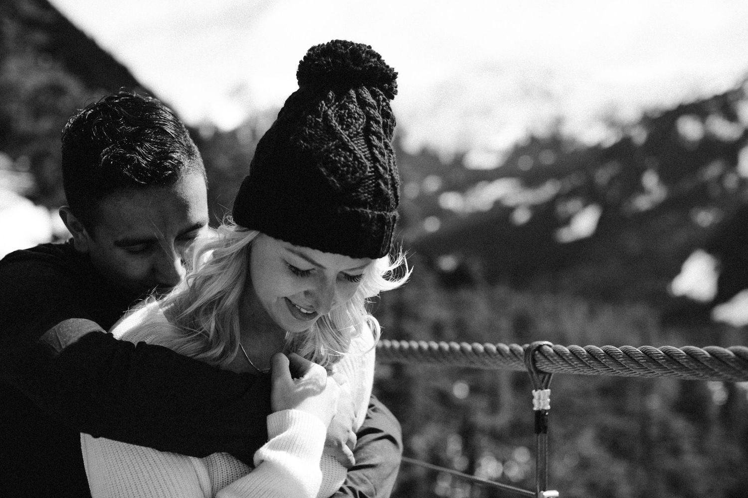 Close-up of couple laughing mid-conversation