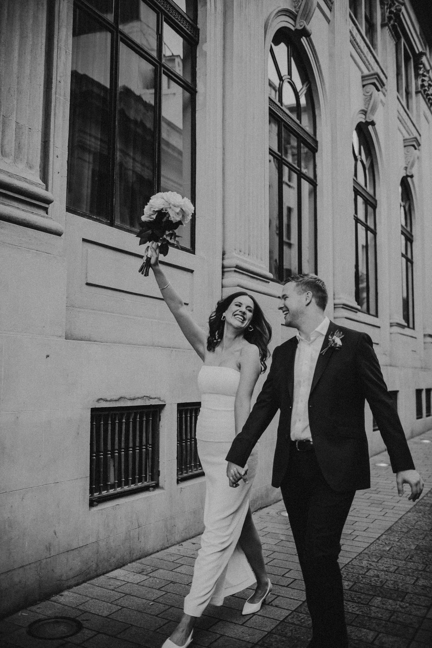 Couple laughing together during outdoor portrait session