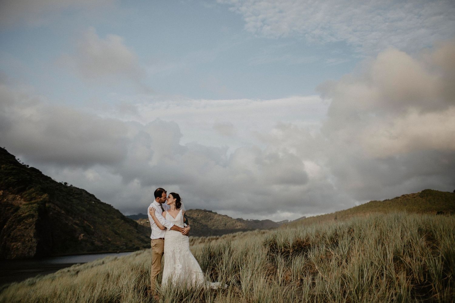 Bride and groom exchanging vows at Waiheke Island wedding