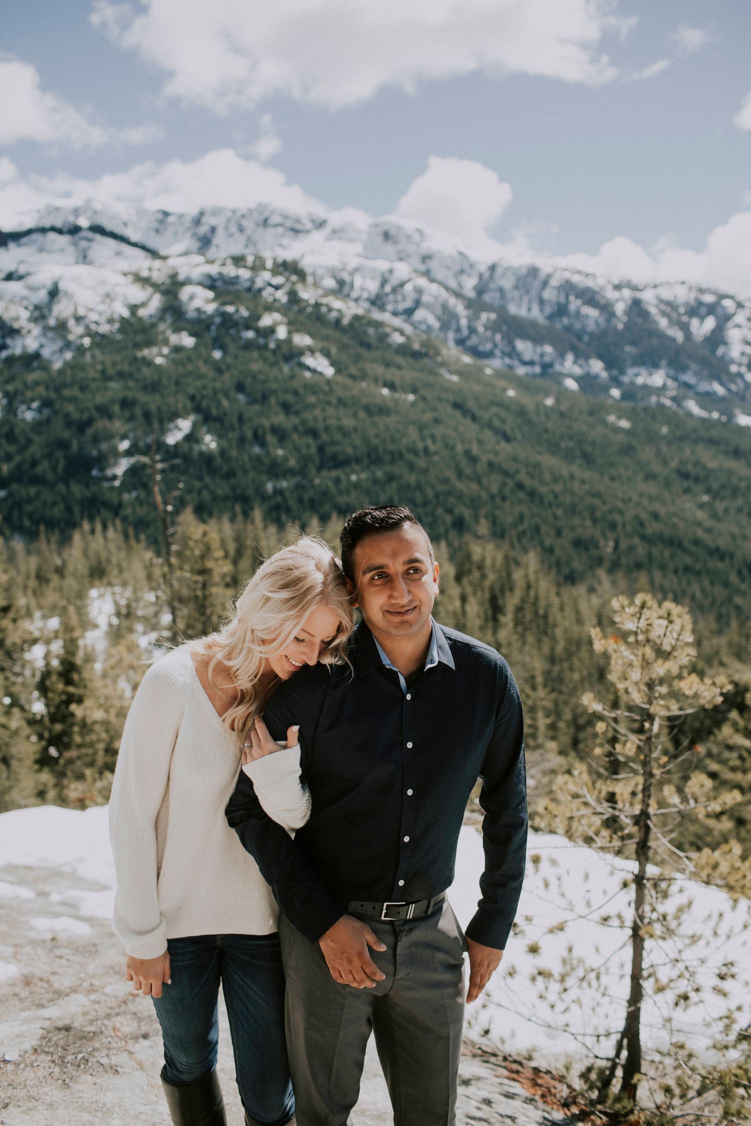 Couple laughing together during engagement session
