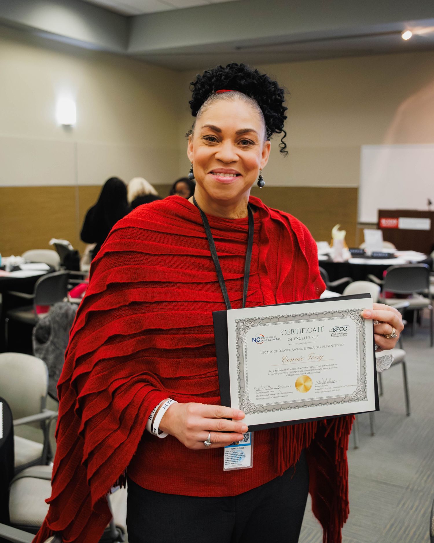 Woman receiving a Corporate award