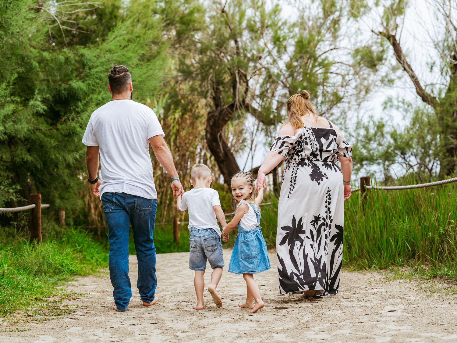 The little glance back that says everything - childhood moving forward while already becoming a memory. Family photography by Herzenshaus.