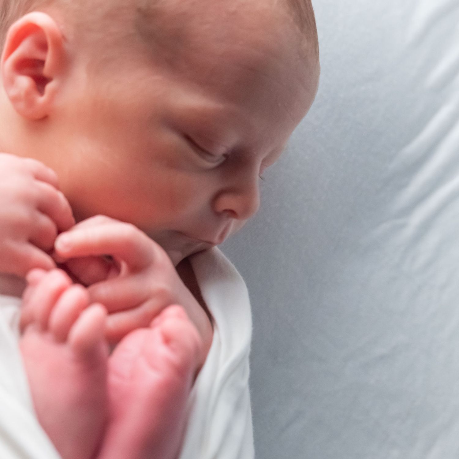 close up micro detail shot of newborn boy in photography studio in East Texas