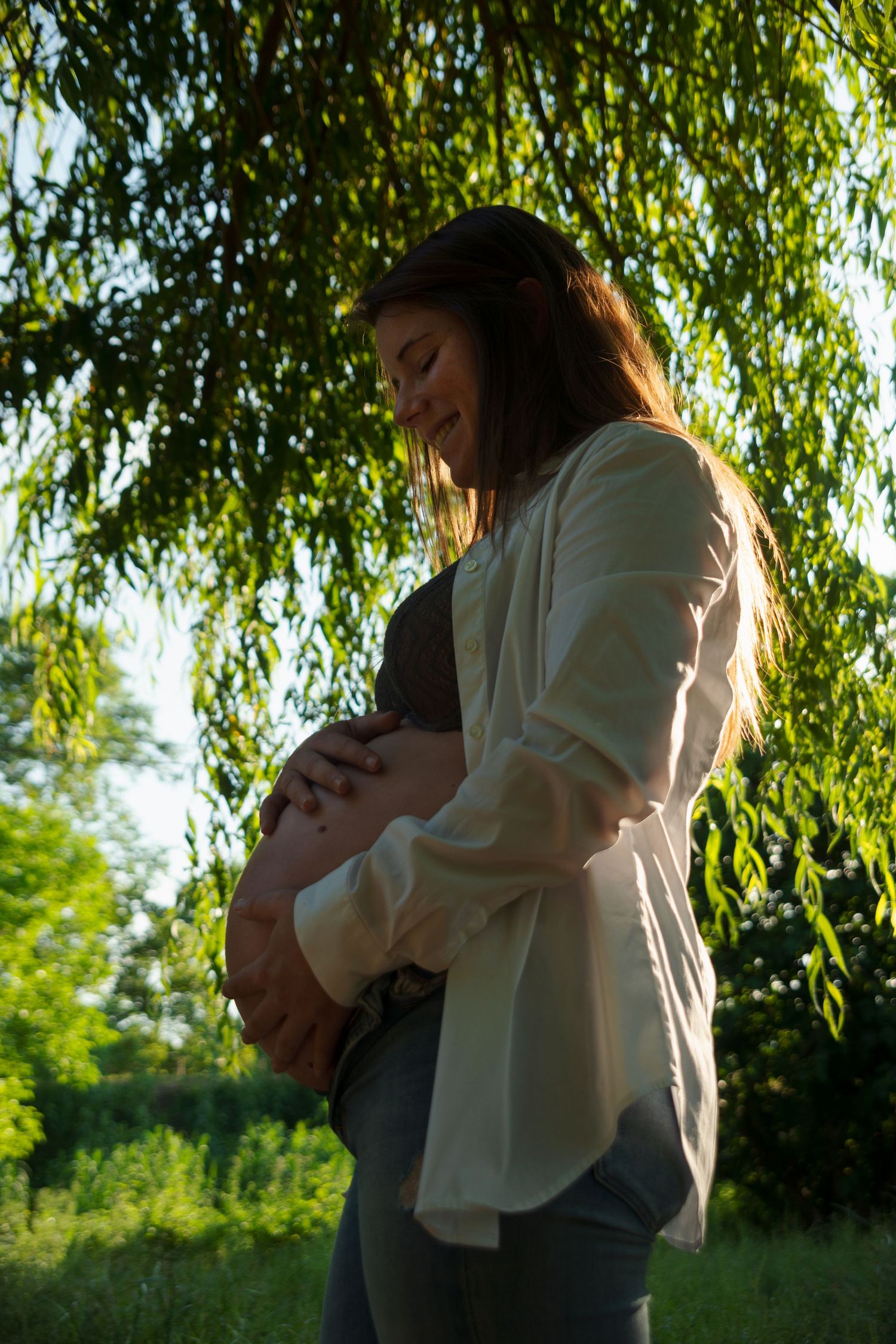 Pregnant woman in the woods