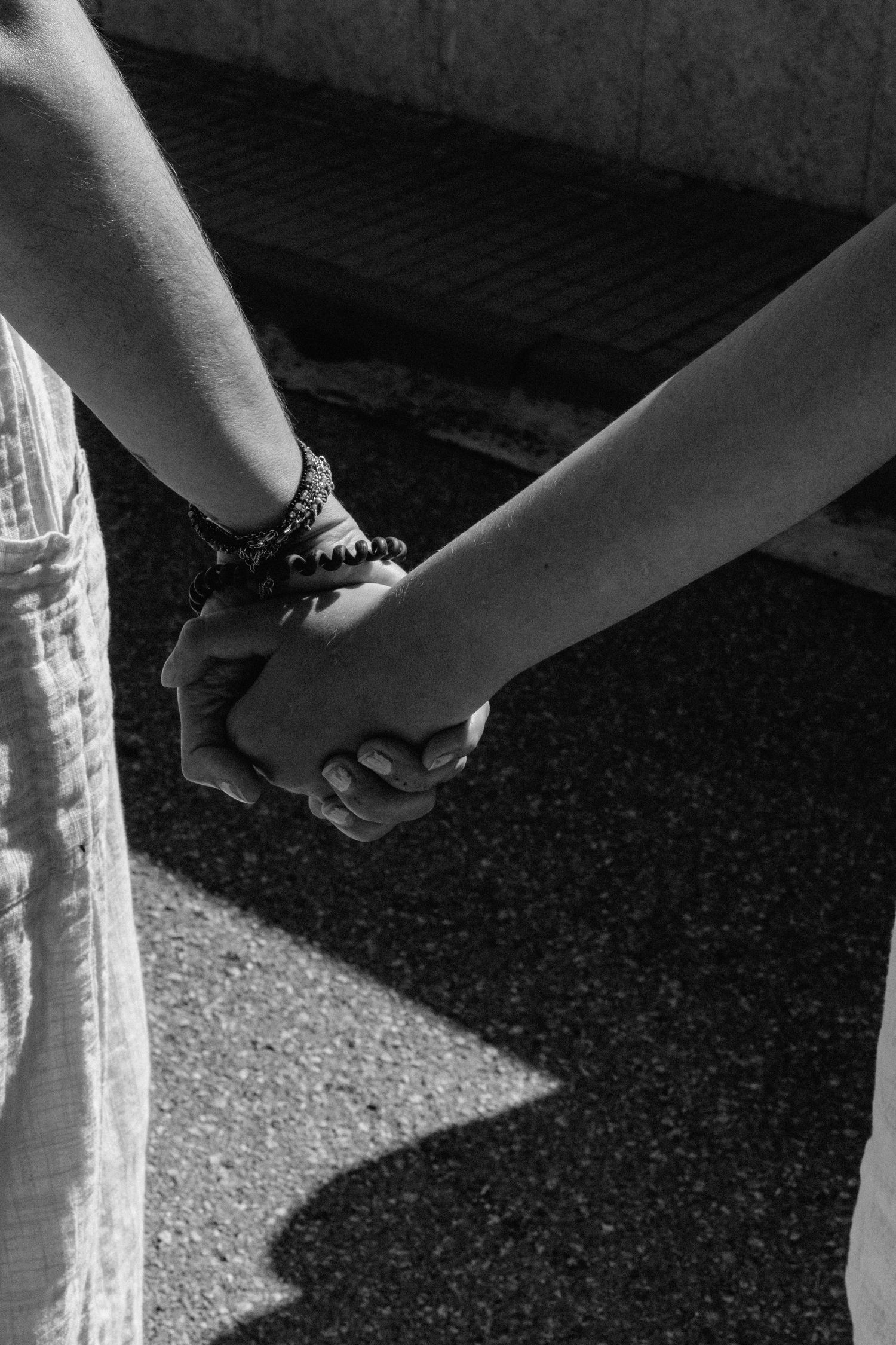 A mother holding hands with her son