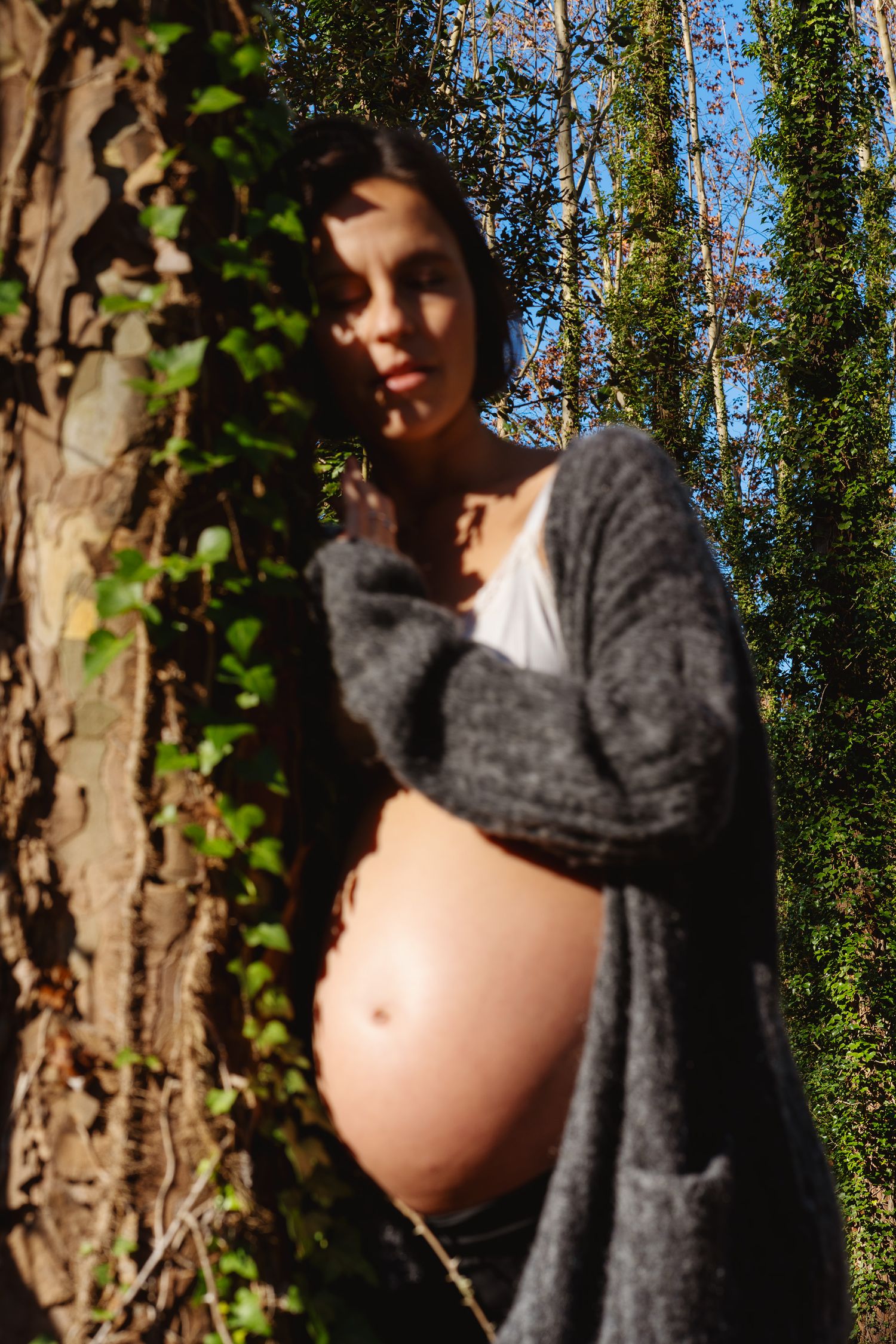 Pregnant woman in the woods