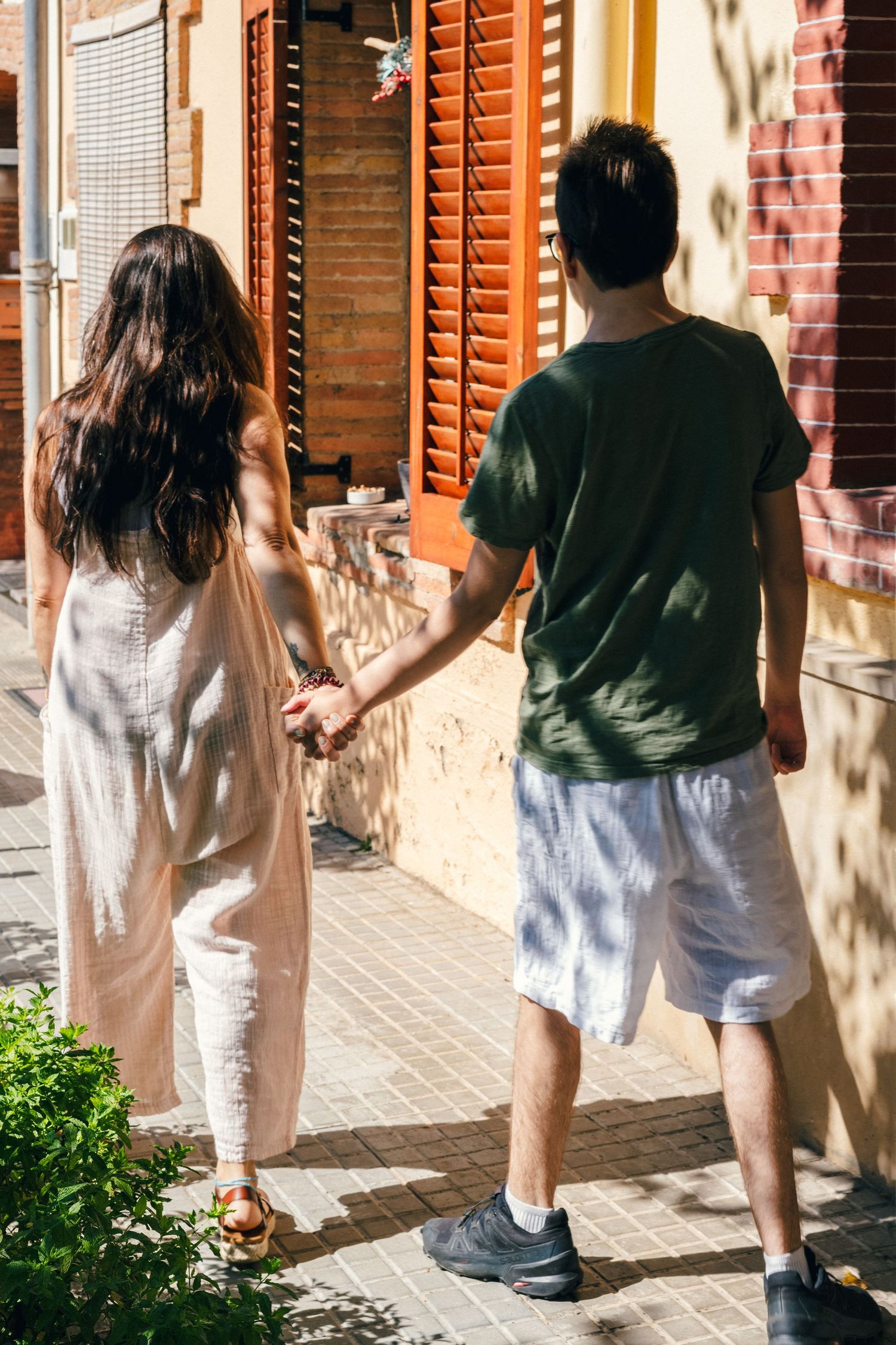 A mother walking with her son