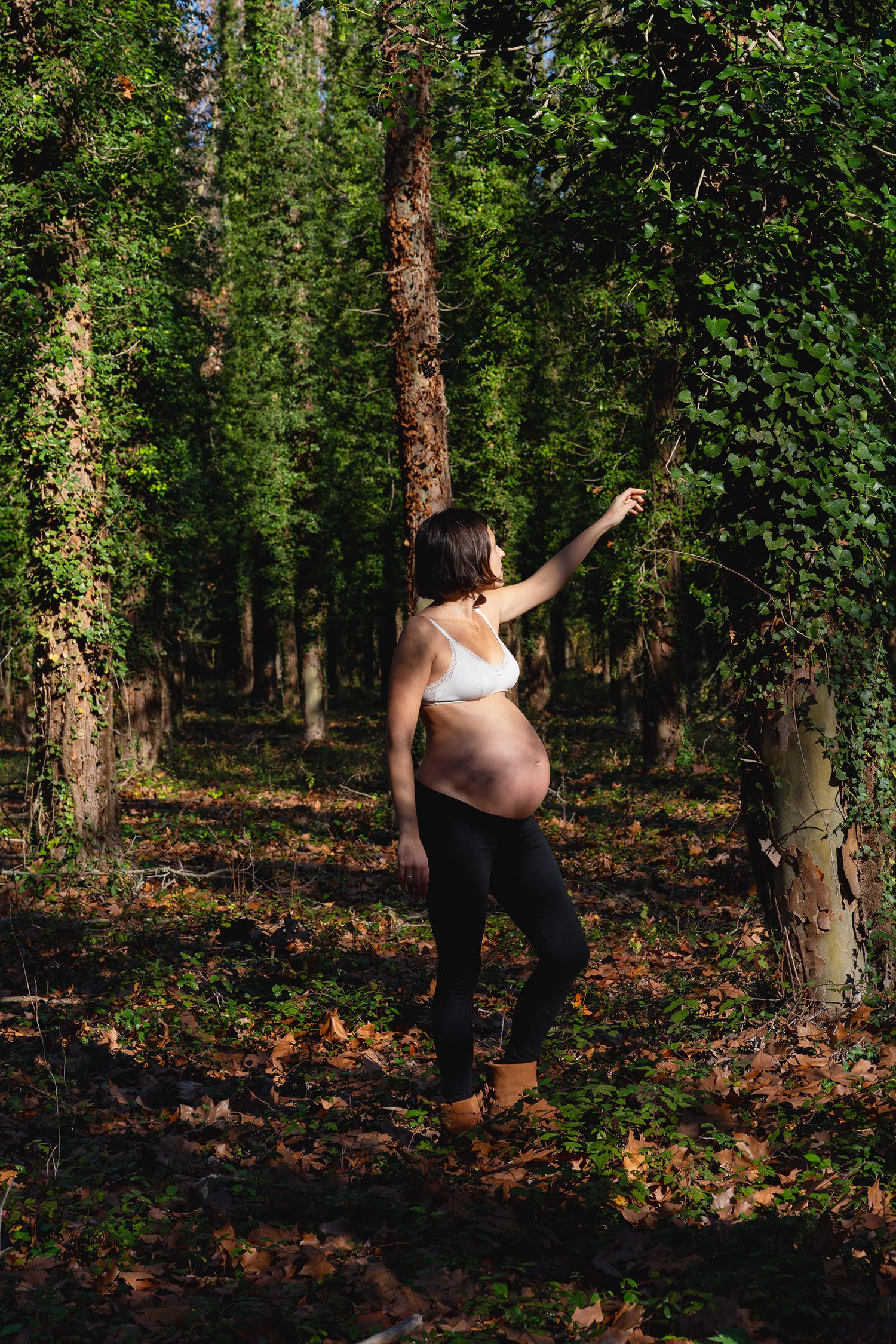 Pregnant woman in the woods