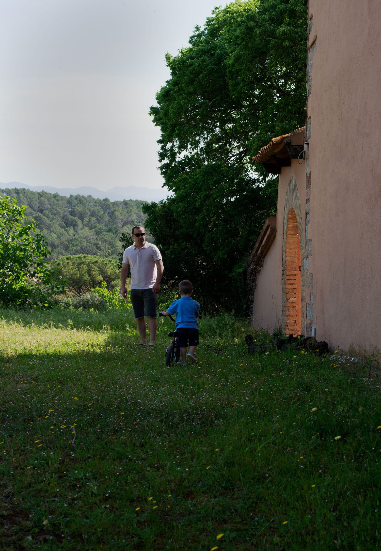 Little boy and his dad in a farmhouse
